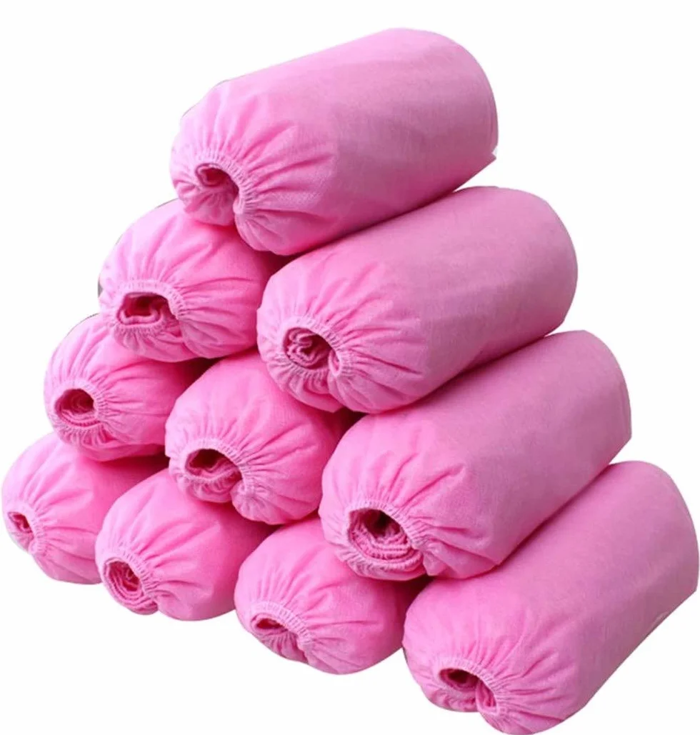 Voarge 100 pezzi tessuto non tessuto usa e getta scarpe plastica protezione pavimento tappeti rosa