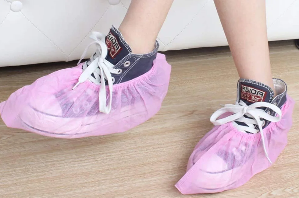 Voarge 100 pezzi tessuto non tessuto usa e getta scarpe plastica protezione pavimento tappeti rosa