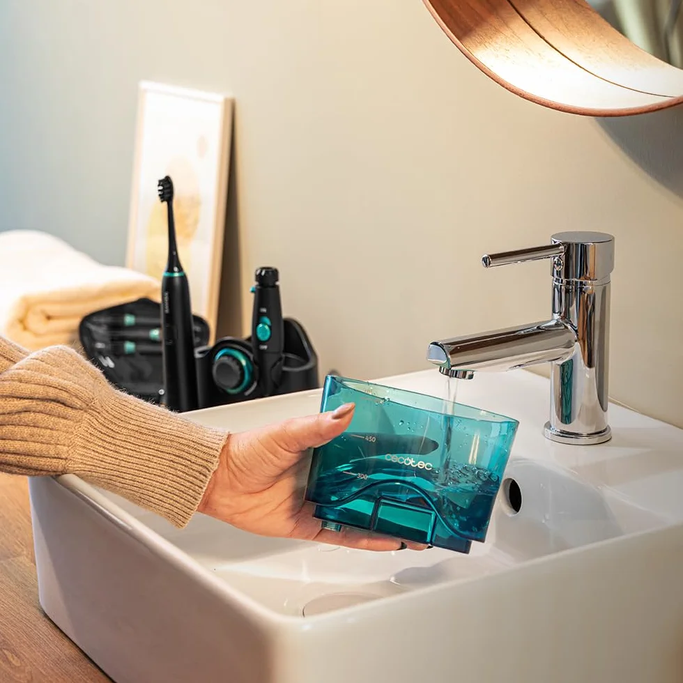 Cecotec ToothCare Jet Clean Irrigatore Dentale 18W 600ml 10 Livelli Pressione 7 Testine Spazzolino Elettrico 5 Modalità
