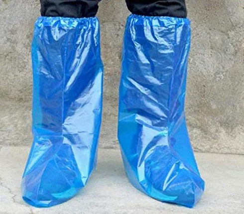 Copriscarpe igieniche allungate usa e getta blu per protezione pavimenti interni